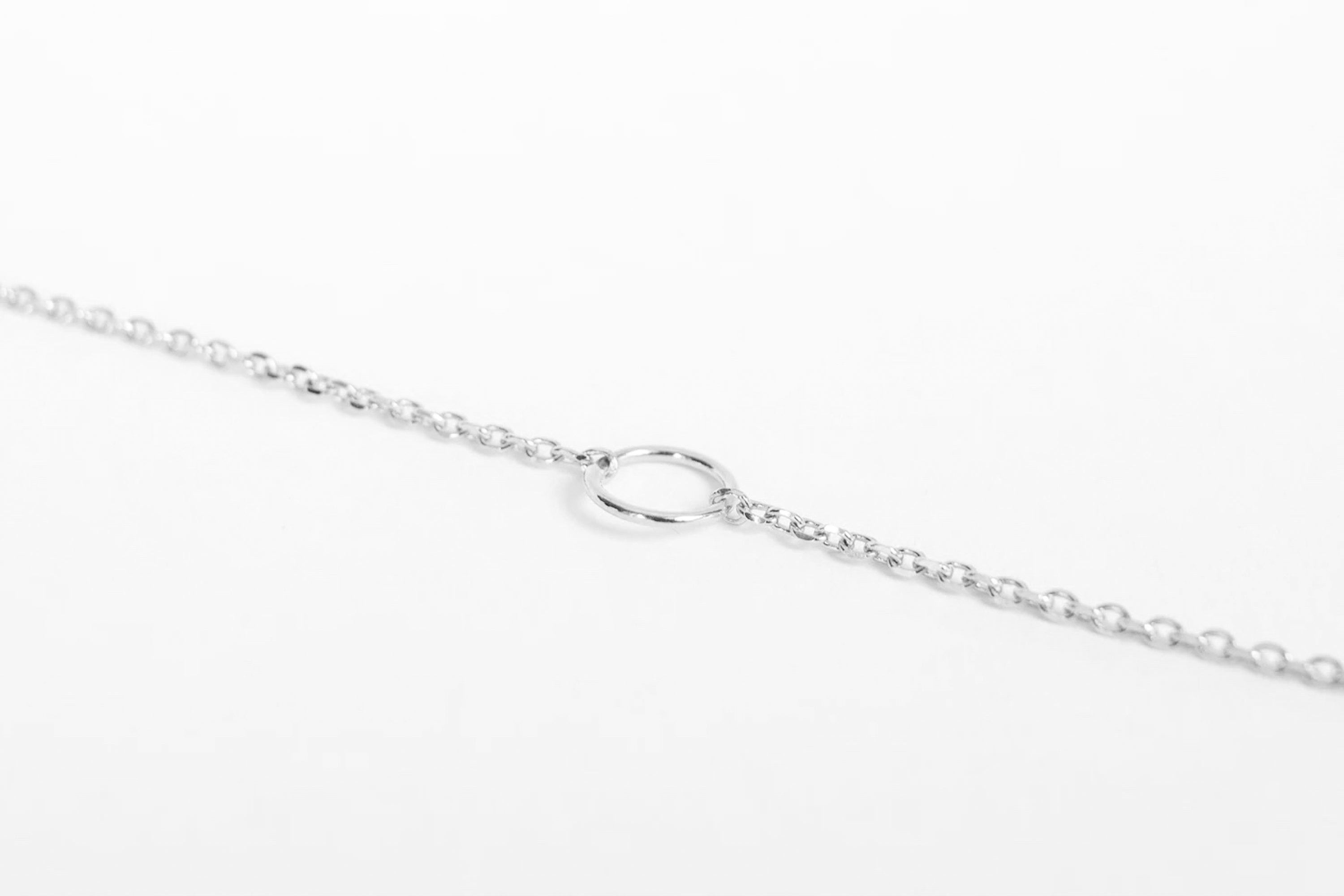 Armbånd med liten ring sølv