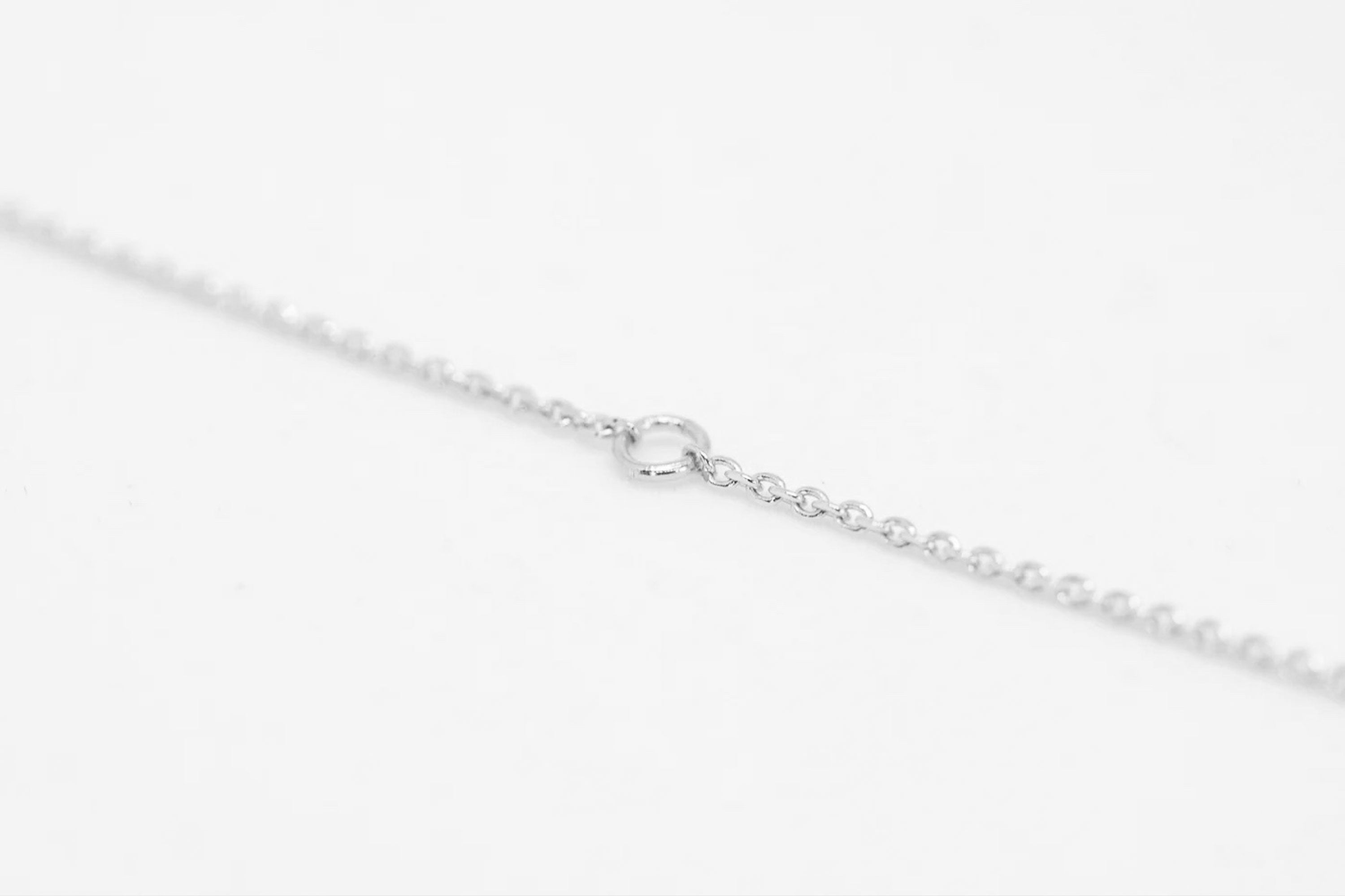 Armbånd med mini ring sølv