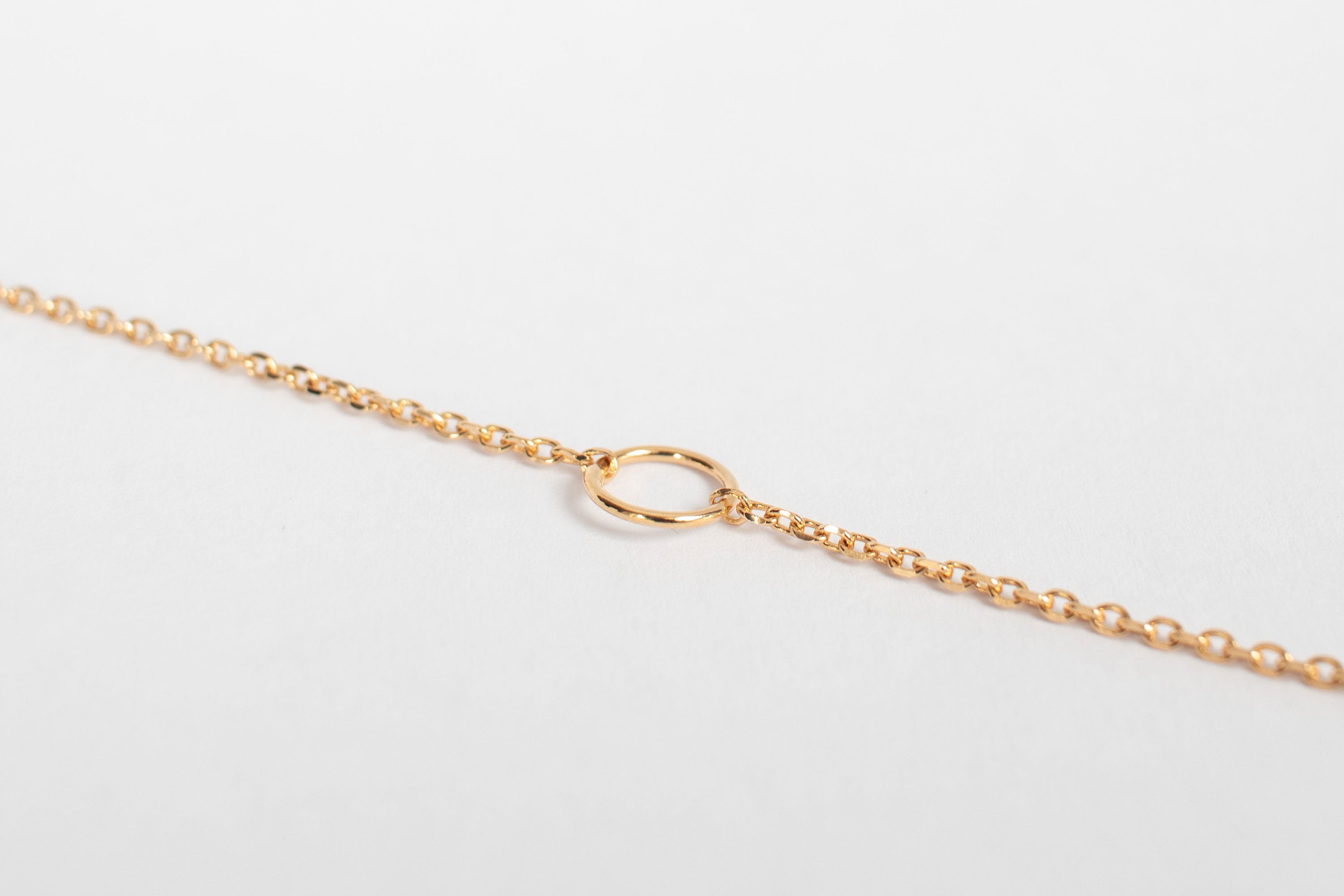 Armbånd med liten ring