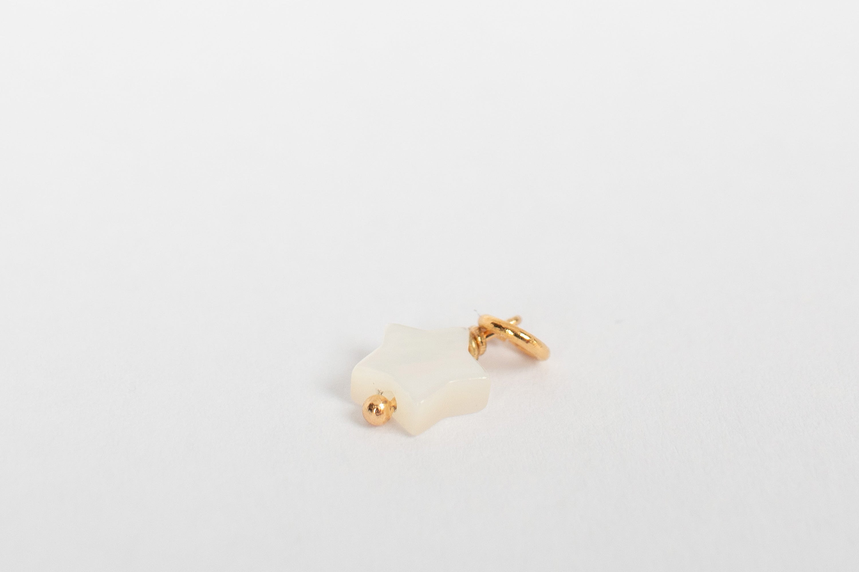 Stjerne perlemor charm