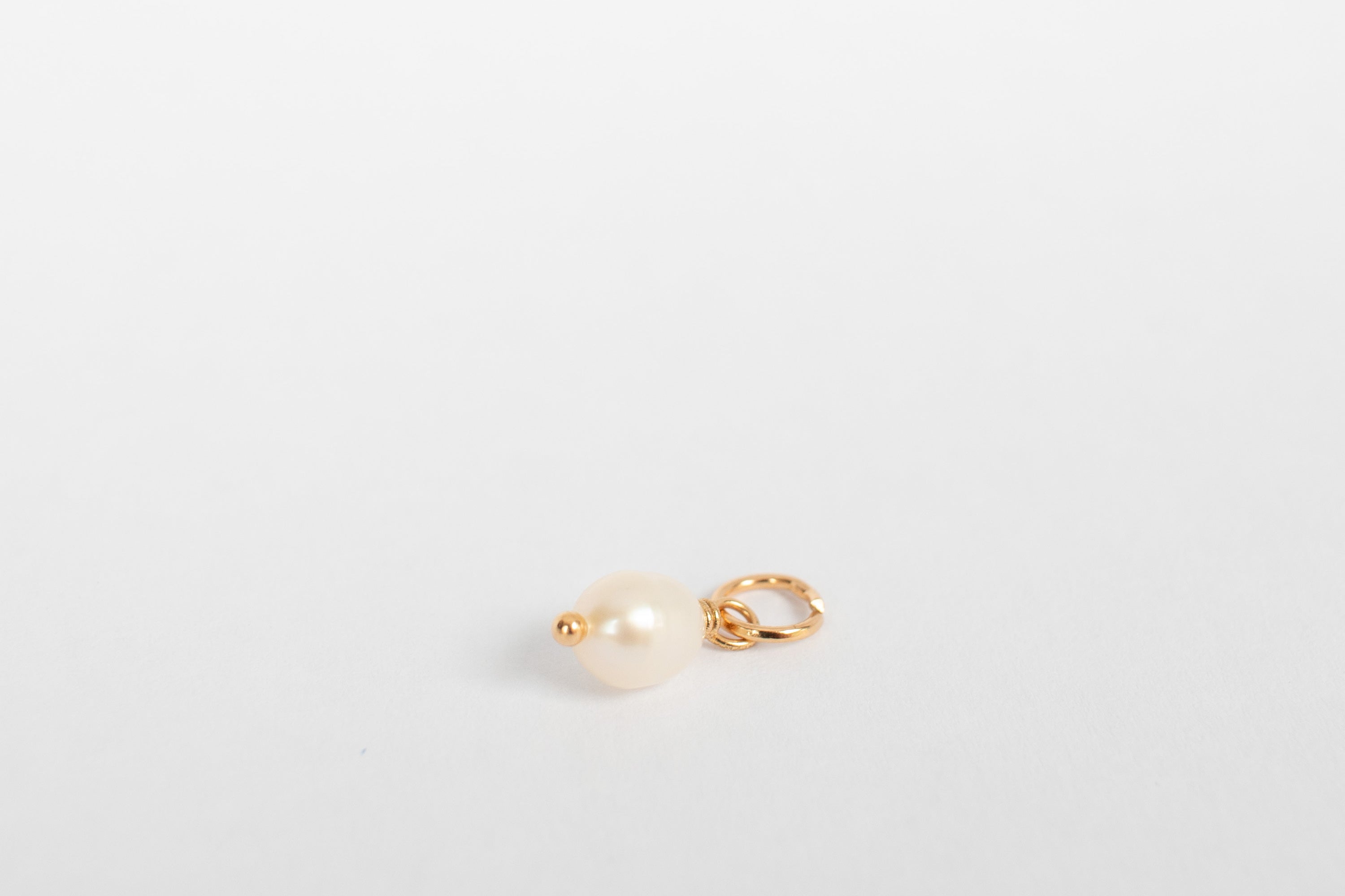 Liten perlemor charm